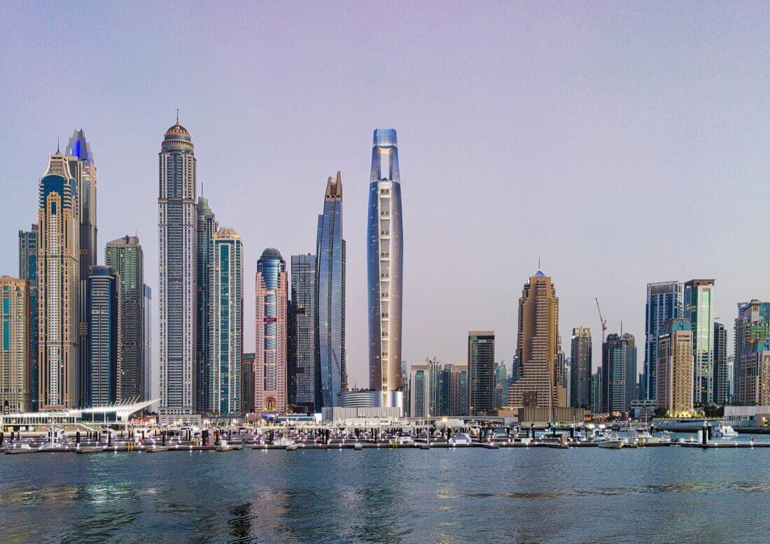 Ciel Tower rising above Dubai Marina at dusk