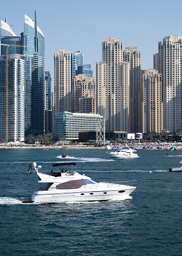 Yacht cruise past the Dubai skyline