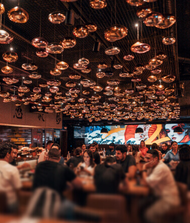 Lantern-filled dining room at Ikigai, Dubai Marina