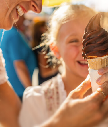 Child enjoying an ice cream at Taste of Dubai