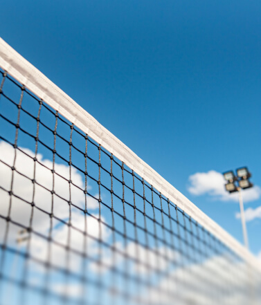 Tennis net against a blue sky at the Dubai Duty Free Championship