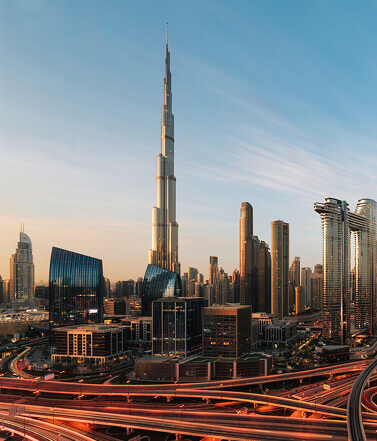 Burj Khalifa rising over Downtown Dubai at sunset